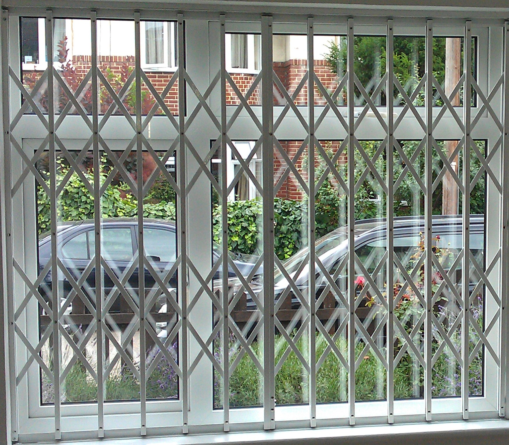 Window security bars installation in progress